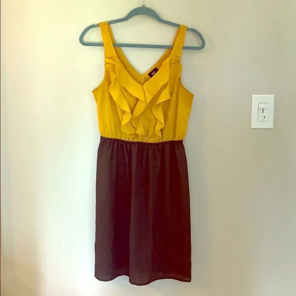 Pencil skirt dress with ruffled neckline.